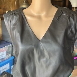 Black leather ish V neck top.